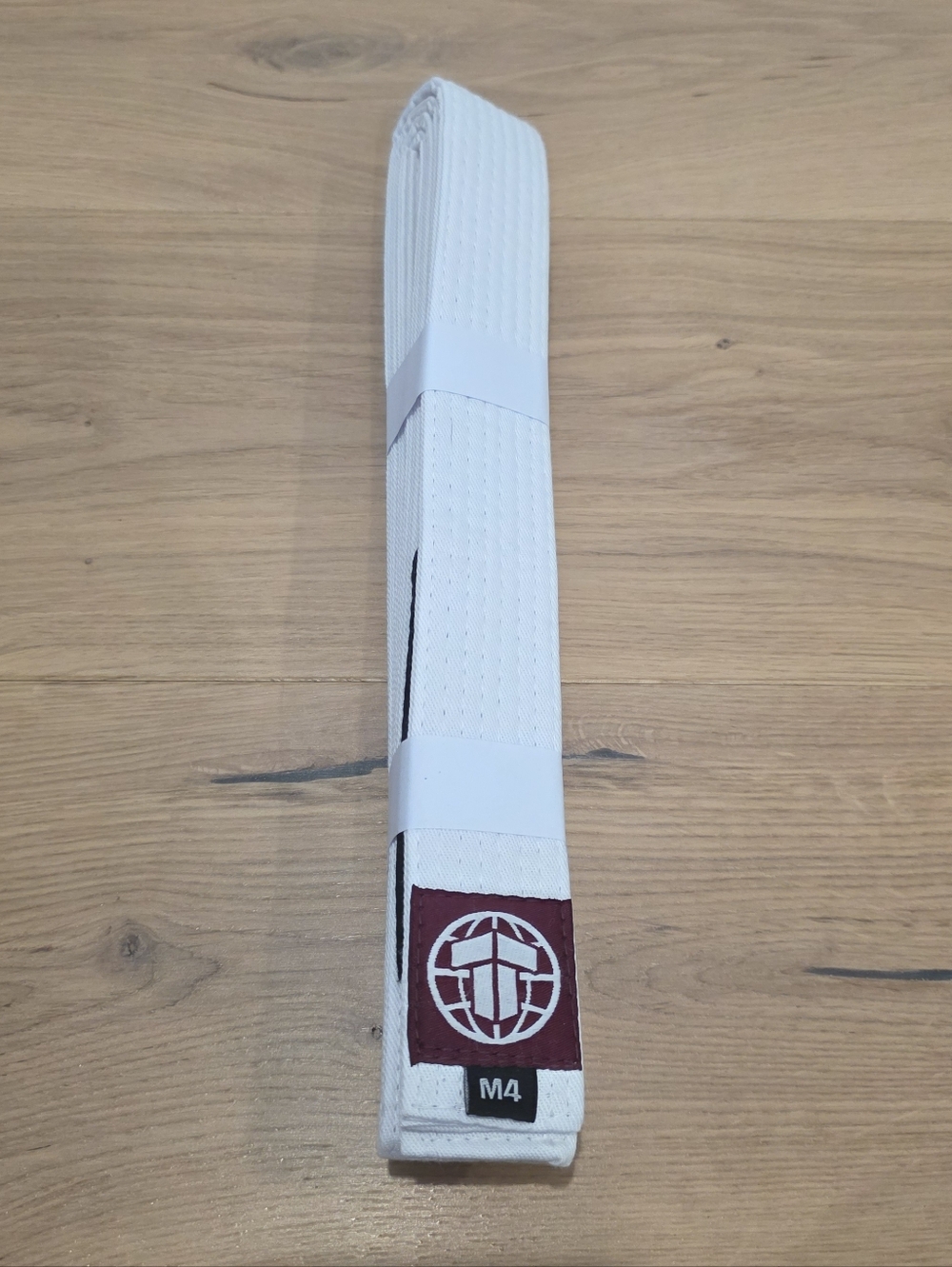 Tatami M4 Jiu-Jitsu White Belt with Red Logo Patch